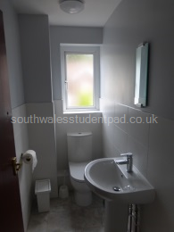 second separate toilet and hand basin