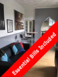 Open plan lounge with dining table and access to court garden